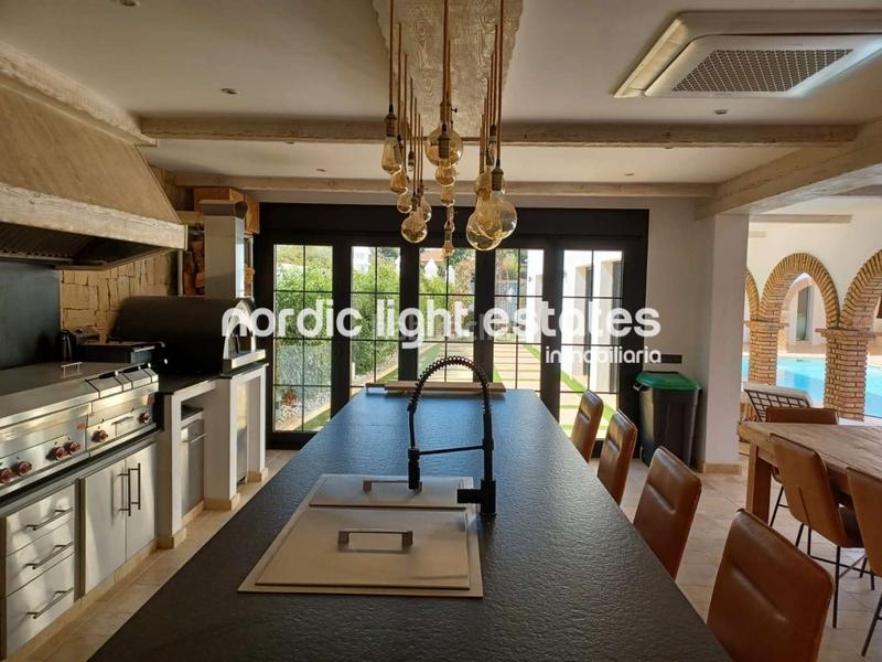 Foto ea5f32ad-6e69-4411-b35b-20e10e672f56. House with parking pool in Coín