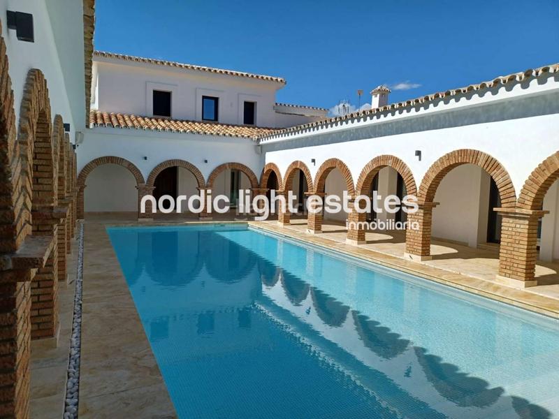 Foto f364e930-f2b5-4e41-87f6-9b980b312e91. House with parking pool in Coín