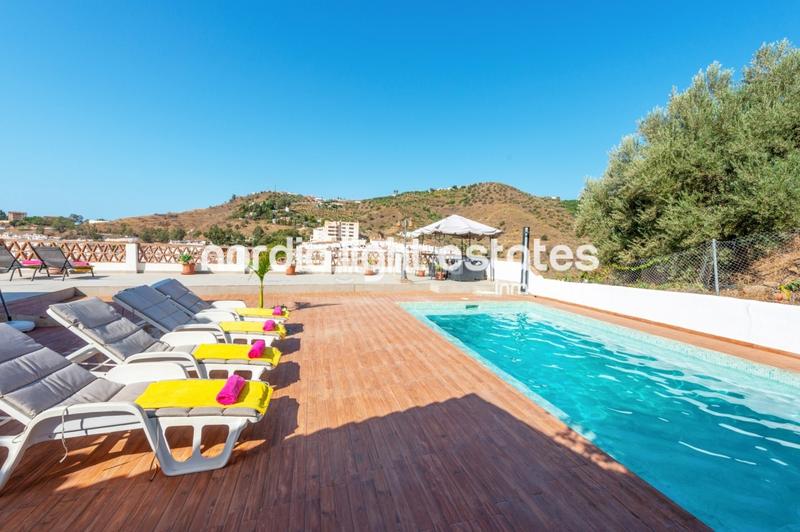 Foto 44c78800-e273-468b-9f21-b38f7d9570e8. Casa con piscina in Torrox pueblo Torrox