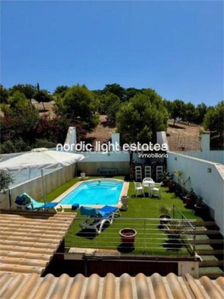 Foto 3f37dce6-2624-4c58-8fdb-5a4f54806fe3. Casa en Santa Isabel Málaga