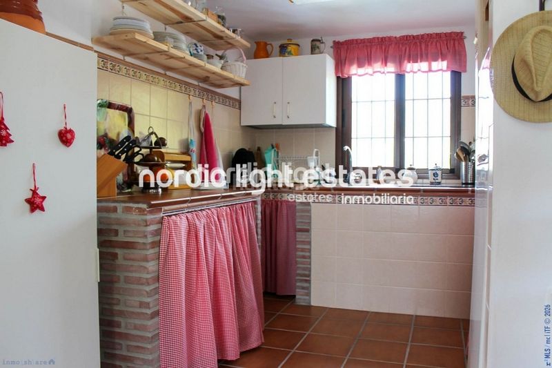 Foto 535cd6ca-e4c6-4a94-a25f-f83258e1a2ac. Casa en Torrox pueblo Torrox