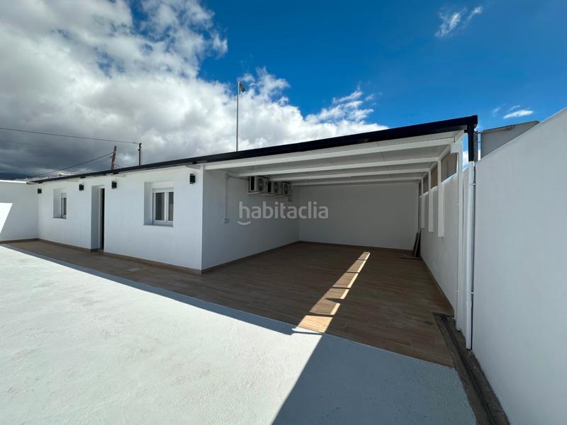 Foto 2a61f892-be52-46b8-98cb-243f63aa4a08. Chalet en Guargacho Arona