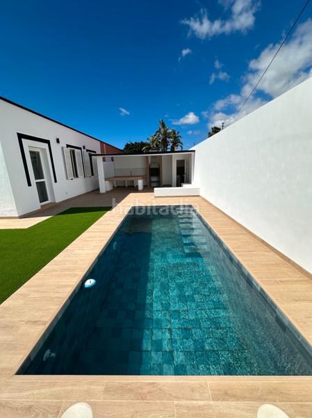 Foto 34f87645-80d2-4f9a-8c03-60997c78c1cc. Chalet en Guargacho Arona