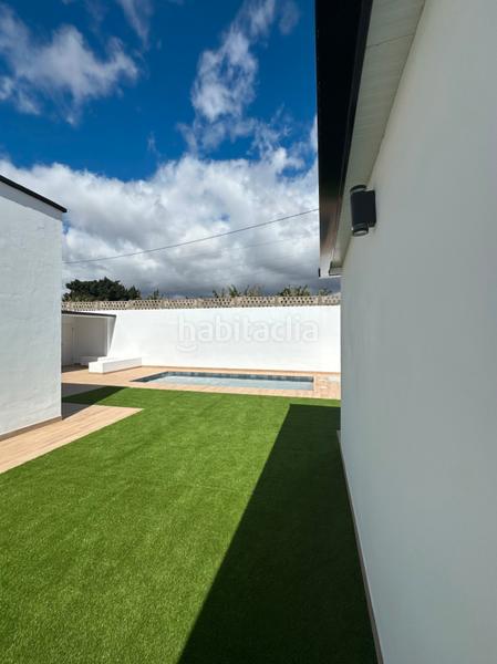 Foto 7098b342-51e2-4465-b6a5-454063347425. Chalet en Guargacho Arona