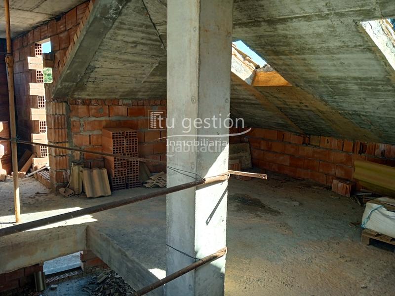 Foto 1105f39f-5e79-49e3-b065-f32991e371a2. Casa adossada amb aparcament a Benamocarra