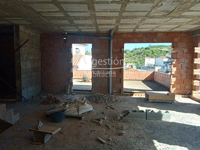 Foto 2bbac1b7-60f2-44db-944e-e8126e8e1b55. Casa adossada amb aparcament a Benamocarra