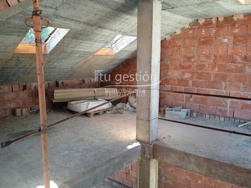 Foto 50ffecbc-428e-4cab-880b-0c50bd8ca2d6. Casa adossada amb aparcament a Benamocarra