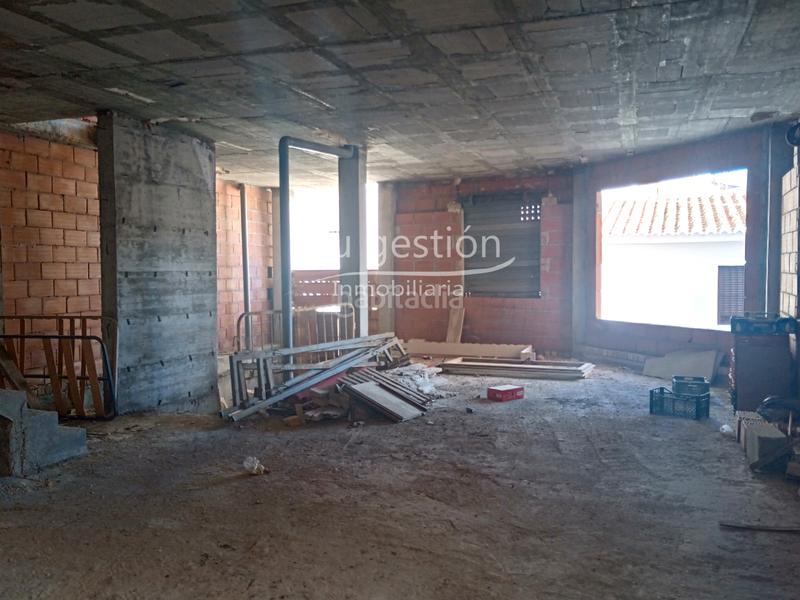 Foto 5c41ea79-c0b4-4c0a-9d2c-8c684134d8e3. Casa adossada amb aparcament a Benamocarra