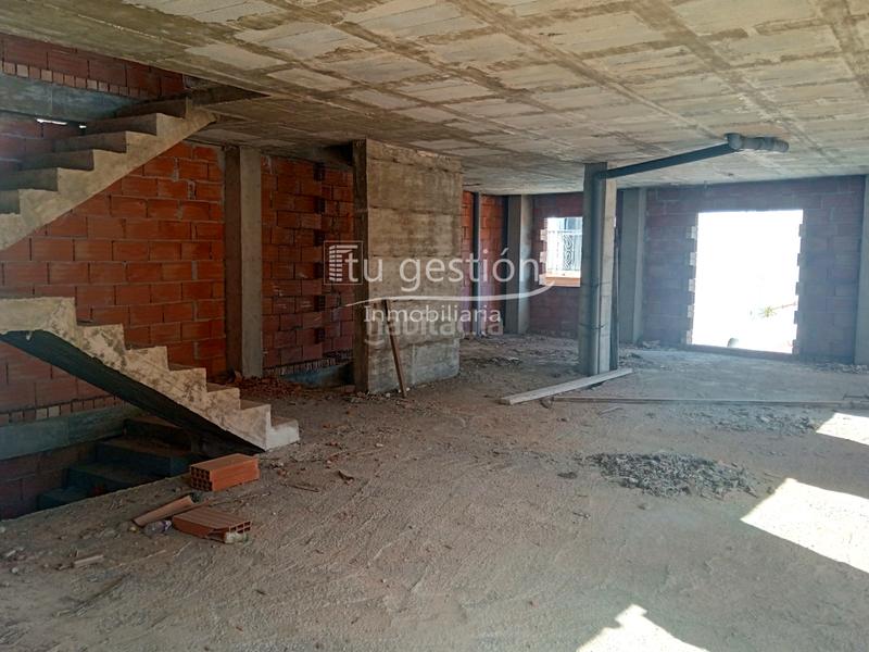 Foto bf39f6c0-1417-4a69-8f50-34af5699b4b7. Casa adossada amb aparcament a Benamocarra