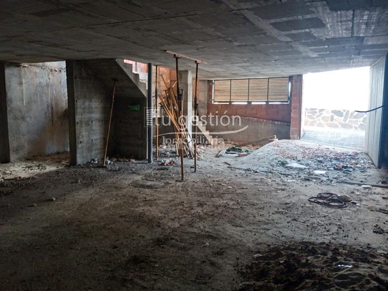 Foto c6c969df-d0a3-4032-92be-e2ec21bf2b94. Casa adossada amb aparcament a Benamocarra