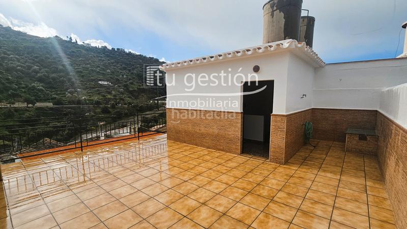 Foto ab6709b3-b7a3-4b85-8e0b-827d47c96e04. Casa adossada a Sayalonga