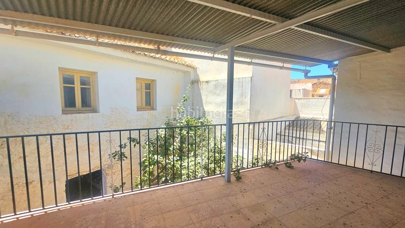 Foto 7046f958-0a40-4a74-a838-372ffc77a900. Semi detached house with fireplace in Alfarnate