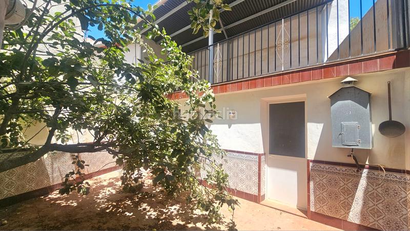 Foto e912e8b5-5a22-4a59-b488-c902332c8357. Semi detached house with fireplace in Alfarnate