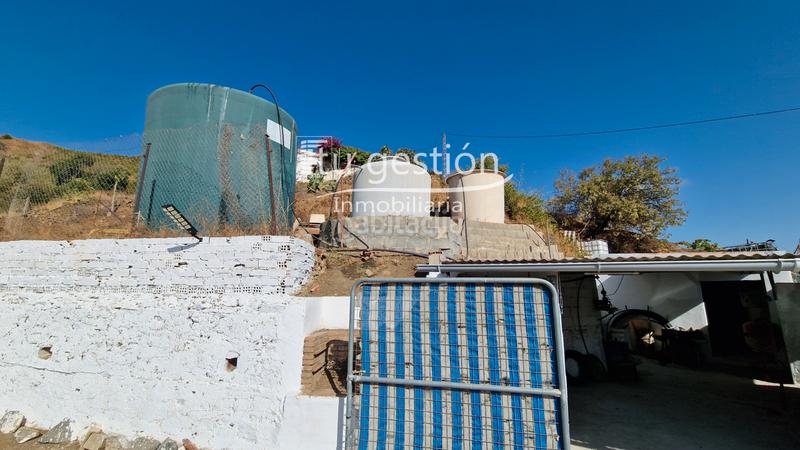 Foto 0f067cb2-4523-4add-ab29-22e68c0cd718. Casa bifamiliare con camino in Almáchar