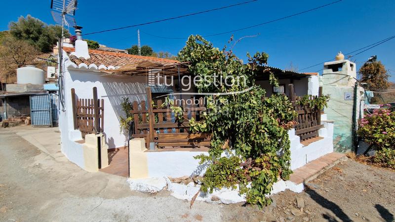 Foto a052c35f-ae6d-46e5-ac81-78763db97912. Casa bifamiliare con camino in Almáchar