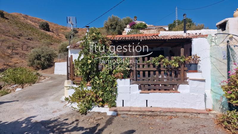 Foto c34585ee-8601-4349-ad84-3d7bb5f9a127. Casa bifamiliare con camino in Almáchar