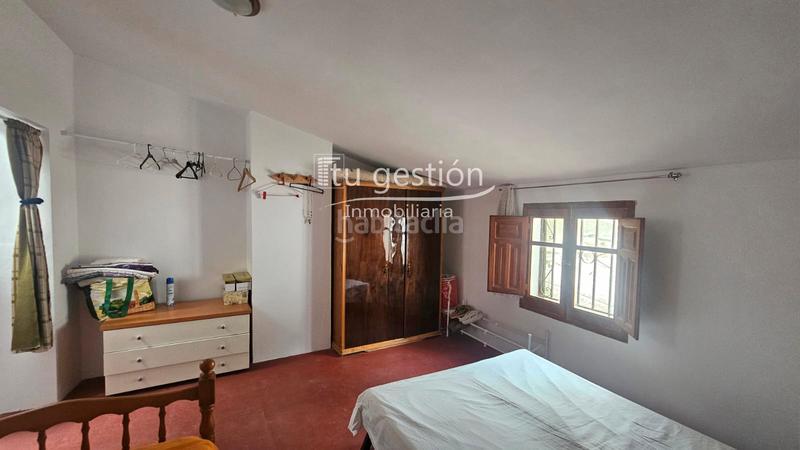 Foto ae015d2a-99c0-4b2d-a15d-ad1176bc83d8. Casa adossada a Alfarnate