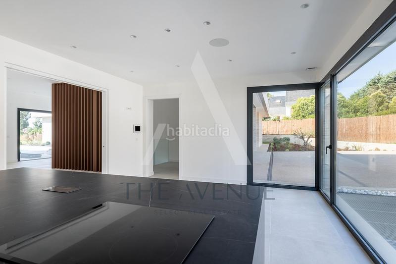 Foto d5d2aca2-b48a-4e23-a5f0-631176d97fc6. Chalet avec parking piscine dans Las Lomas Boadilla del Monte