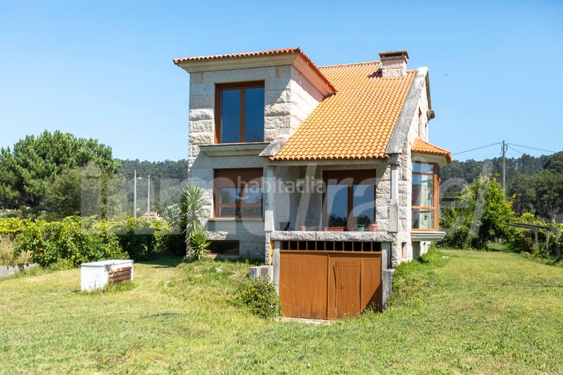 Foto 2a08fb5a-5776-4ede-a850-0941e07a1ef2. Chalet casa de piedra en construcción en o casal - Nantes - en Sanxenxo