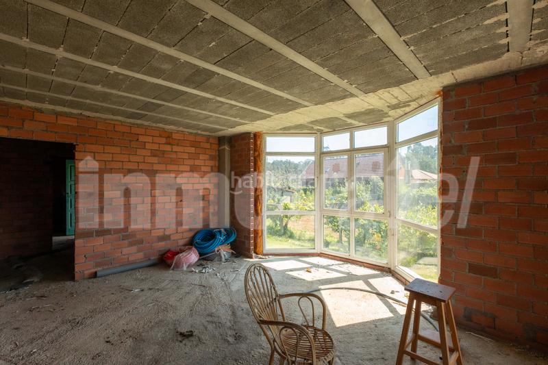 Foto fda7beb4-00ba-4fa9-ab09-d7d2d815b91a. Chalet casa de piedra en construcción en o casal - Nantes - en Sanxenxo