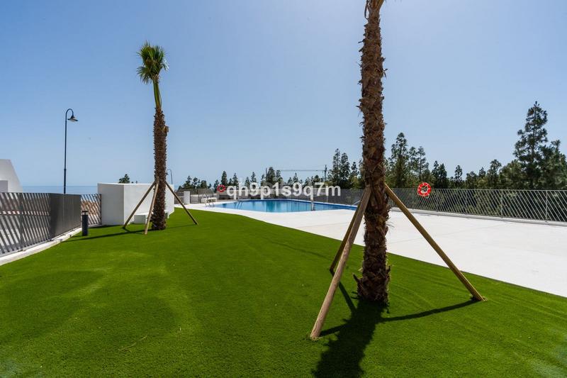 Foto 0e3cd861-9c94-4992-b7ab-0f74db84041a. Casa a schiera con parcheggio piscina in El Faro de Calaburra - Chaparral Mijas