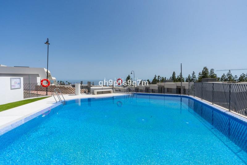 Foto 5ab804d2-03a1-4e01-a872-144296ca46bb. Casa a schiera con parcheggio piscina in El Faro de Calaburra - Chaparral Mijas