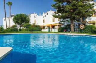 Maison jumelée à Montemar. Adosado en venta en torremolinos, 4 dormitorios.