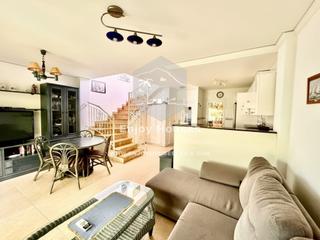 Casa adosada en Poblets (els). Encantadora casa adosada con jardín privado y piscina comunitari