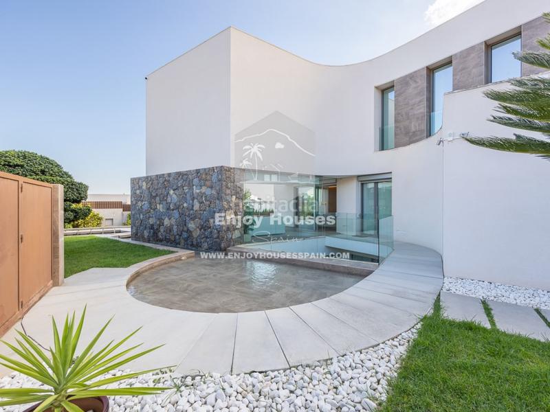 Foto 5256506e-ede3-4f59-bbfe-7f4396040a77. Casa a Golf Bahía Finestrat