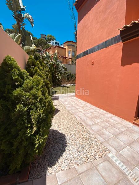 Foto 31b54844-00f0-4aec-ab8f-7962df489935. Casa pareada en calle los naranjos 2a ¡descubre tu nuevo hogar en la exclusiva zona de playamar, ! esta espectacular vivienda pareada, situada a escasos en Torremolinos