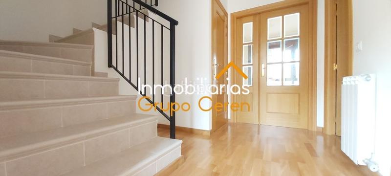 Foto 48059667-f611-4032-b939-e605ee04d64b. Casa adosada adosado a estrenar con jardín privado en urbanización con piscina y amplia zona verde en Canillas de Río Tuerto