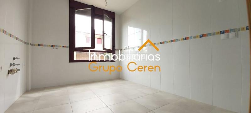 Foto 56835f8e-aadf-452c-af2f-4809ad65b2d8. Casa adosada adosado a estrenar con jardín privado en urbanización con piscina y amplia zona verde en Canillas de Río Tuerto