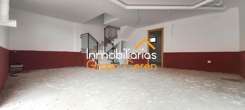 Foto 598296c8-4a7a-4bf6-a1a6-32ad487ed721. Casa adosada adosado a estrenar con jardín privado en urbanización con piscina y amplia zona verde en Canillas de Río Tuerto