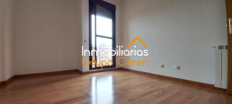 Foto 80ca8cee-505a-47f0-abca-56cf3dbd670b. Casa adosada adosado a estrenar con jardín privado en urbanización con piscina y amplia zona verde en Canillas de Río Tuerto