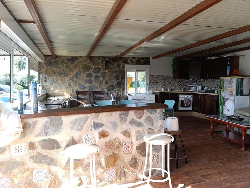 Foto abf3c816-fe94-42d4-bf01-6b17f235f071. Chalet increíble chalet en lora del rio totalmente reformado con piscina y olivar en Lora del Río