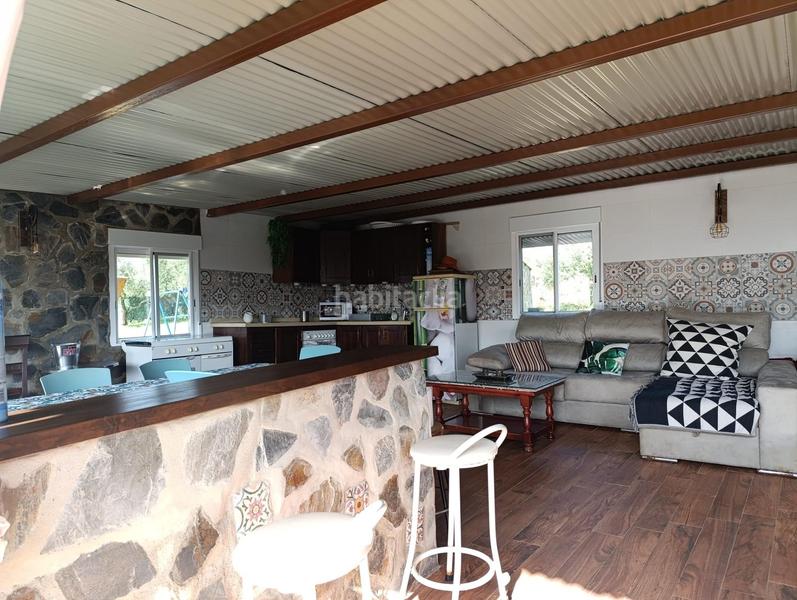Foto b45325d2-fcc9-4302-a8c7-9daba7e2126a. Chalet increíble chalet en lora del rio totalmente reformado con piscina y olivar en Lora del Río