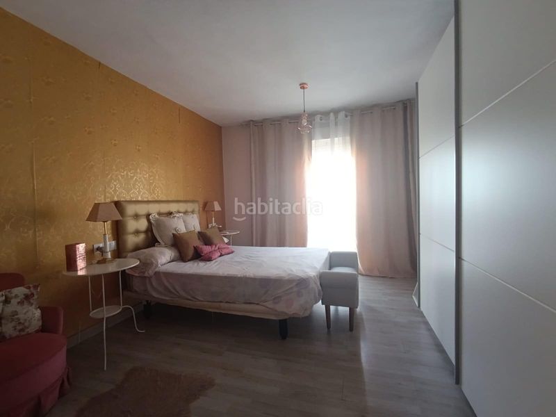 Foto 5dc1f4c8-ac4e-4300-bb00-fed42a99f185. Casa adossada amb calefacció a La Paz Alcalá de Guadaira