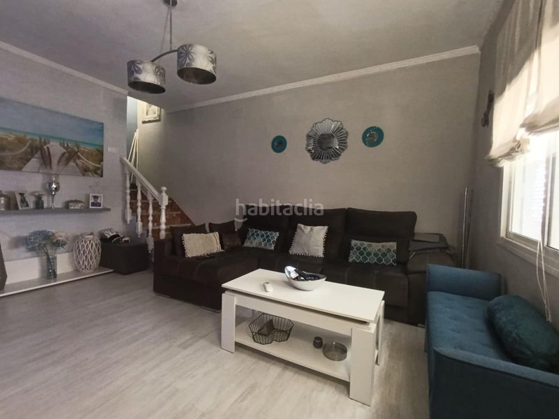 Foto ae5c2a5b-5856-4180-809a-61375b125623. Casa adossada amb calefacció a La Paz Alcalá de Guadaira