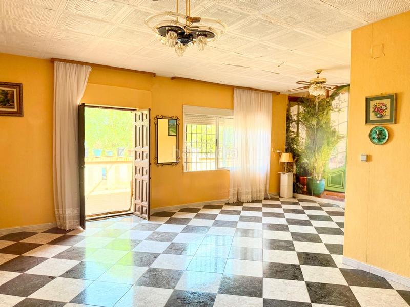 Foto 2a116873-7697-4555-91b0-db5132e1f63b. Casa chalet con doble vivienda, buhardilla, gran parcela y piscina en urbanización torrepalma en Carmona