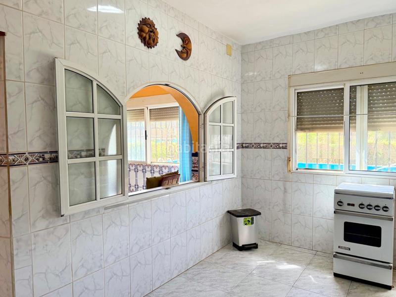 Foto 42d205fc-28c8-4f7b-b1dc-de2f41fde7d7. Casa chalet con doble vivienda, buhardilla, gran parcela y piscina en urbanización torrepalma en Carmona