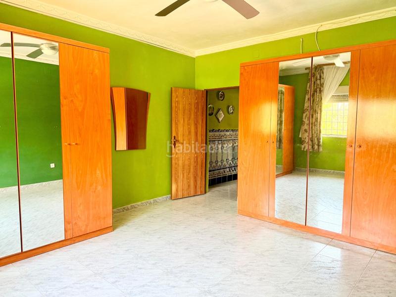 Foto b8b4d282-1e07-4684-9678-81590bb8ebab. Casa chalet con doble vivienda, buhardilla, gran parcela y piscina en urbanización torrepalma en Carmona