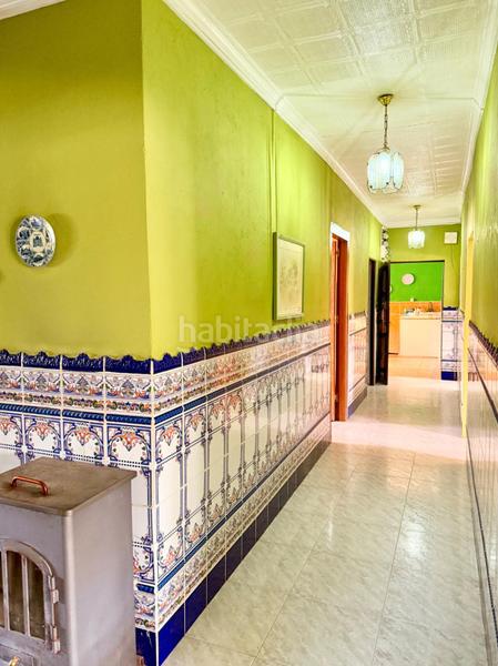 Foto dc17cb25-b0f9-4b2f-8d8b-ae6c18fec0e2. Casa chalet con doble vivienda, buhardilla, gran parcela y piscina en urbanización torrepalma en Carmona