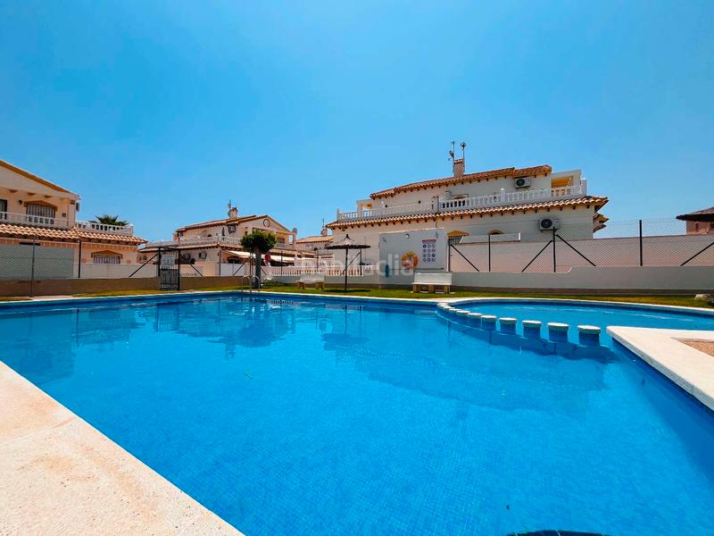 Foto c2b921f9-a3a9-4634-a0c3-c02ec8d2177d. Maison avec piscine dans Los Balcones y los Altos Orihuela