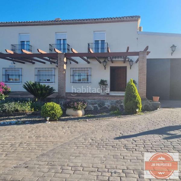 Foto 2ab9cd6f-d93b-41e0-bdb3-882417e8a5a0. Bauernhof mit pool in Coín