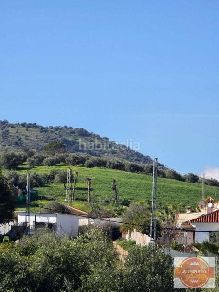 Foto b8cd6703-90b7-4c7d-a88a-abe8484ca952. Casale con parcheggio in Coín