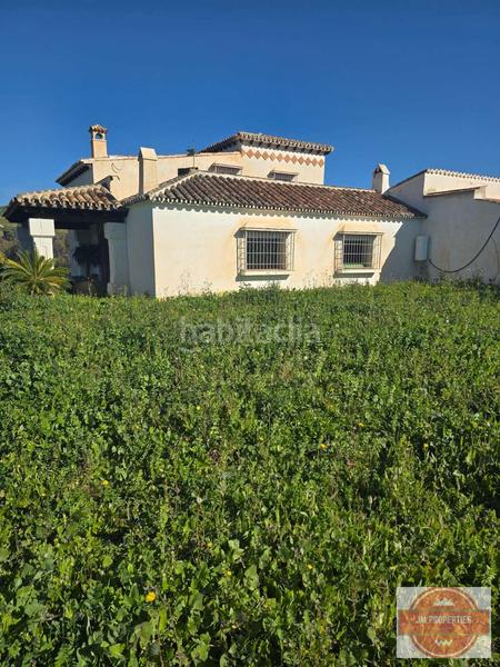 Foto cf87ac9e-6453-41fb-b83f-854cd4413679. Casale con parcheggio in Coín