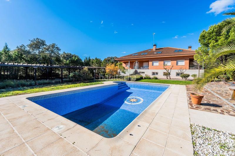 Foto 1835c96d-b7ff-4ed6-961a-7604129d4418. Casa amb calefacció piscina a Navalquejigo-Los Arroyos Escorial (El)