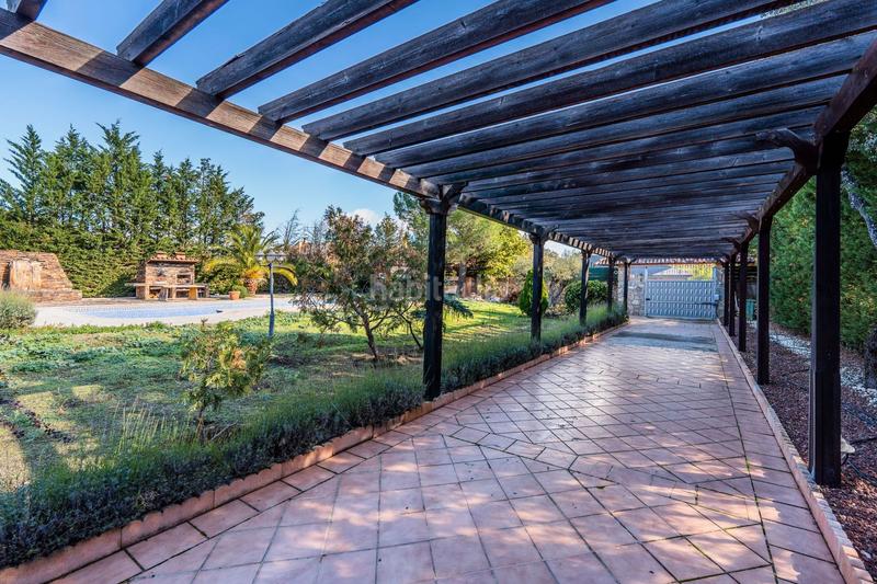 Foto ce3cea85-d0cc-49f0-8e96-91074c9007c1. Casa amb calefacció piscina a Navalquejigo-Los Arroyos Escorial (El)