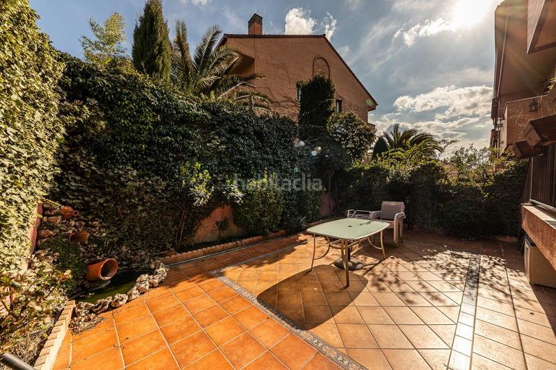 Foto 08b73469-b8a9-43ae-bbb3-ccbd2d880613. Casa adossada amb piscina a Parque Coimbra Móstoles