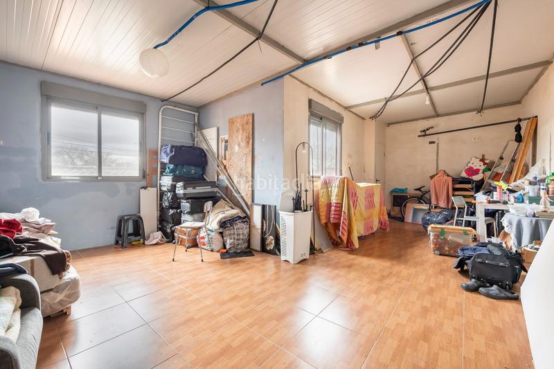 Foto be3ac953-7c32-43a0-94bf-a74f7bba5cee. Casa a schiera in Palomeras Sureste Madrid